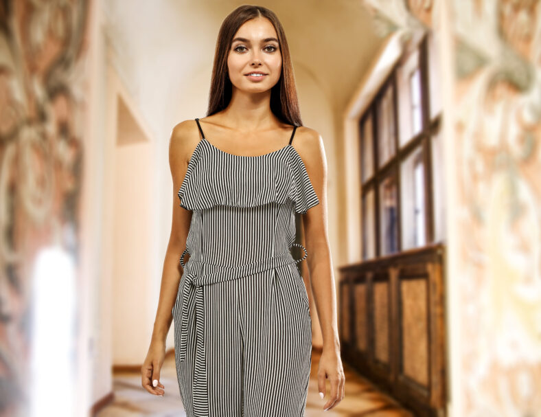 Slim young woman in home interior