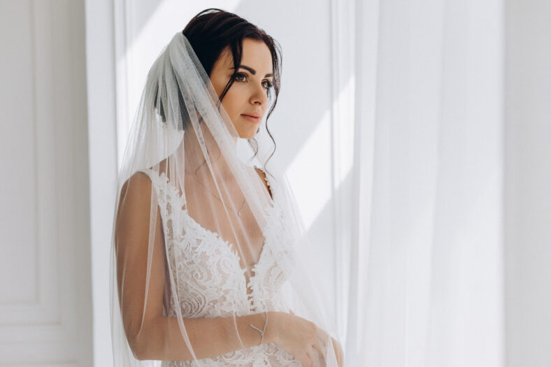 Morning of the bride. Portrait of a bride in a white dress.