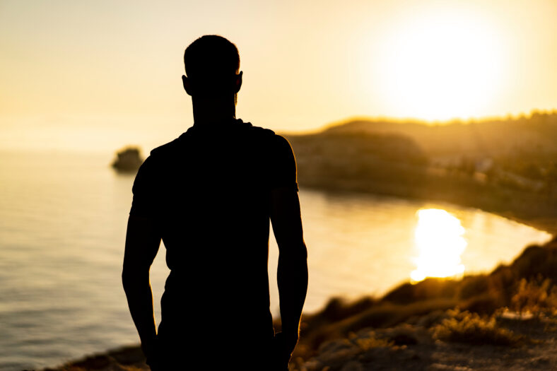 silhouette of a man on the beach