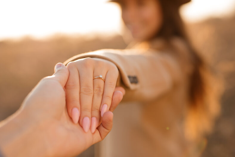 woman with an engagement ring
