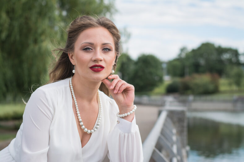 Outdoor summer fashion portrait of young elegant lady, Gorgeous young model