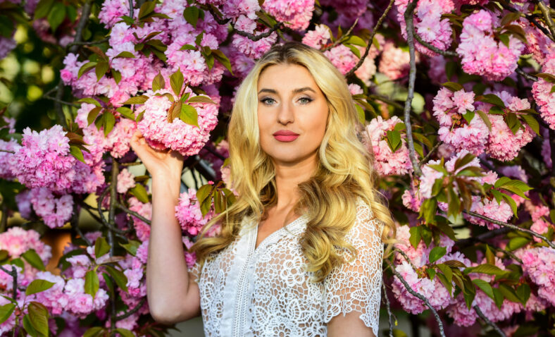 Tenderness and femininity. Spring symbol. Girl enjoy sakura in garden. Rest relax and vacation. Spring blossom. Cherry tree. Floral aroma. Reasons why flowers make women happy. Happy spring day.