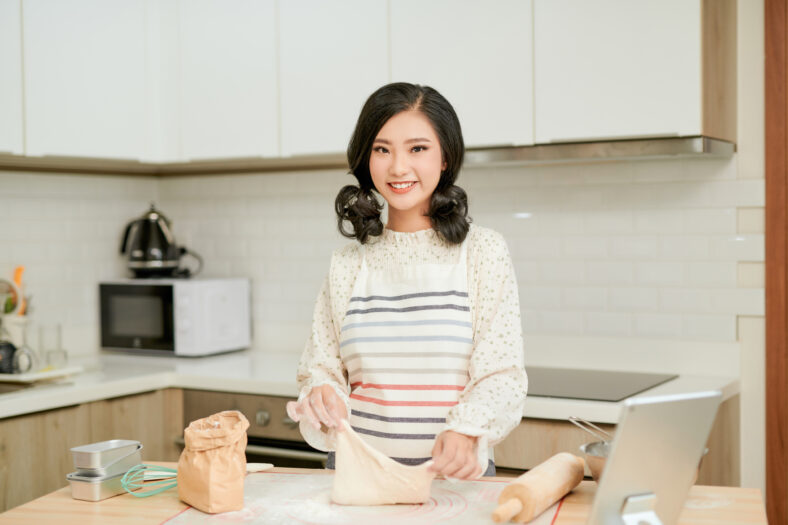 Pleasant woman cooking in the kitchen