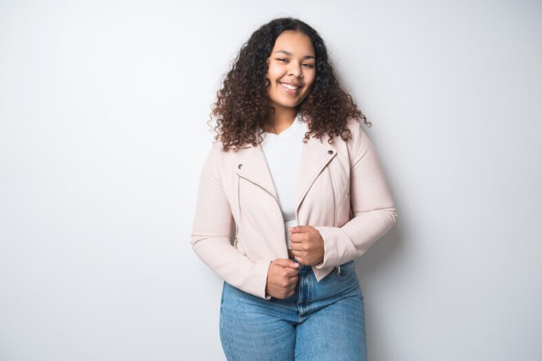 A Studio portrait of beautiful brunette young dark-skinned woman