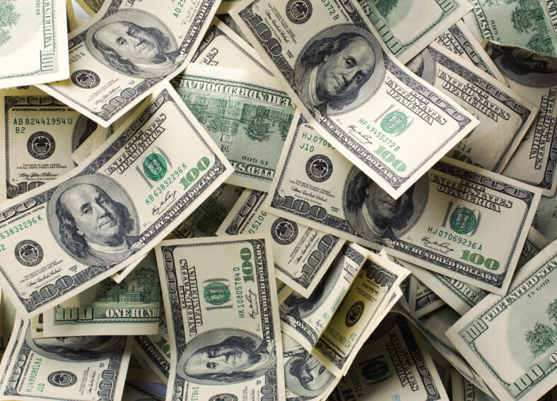 Heap of $100 dollar bills