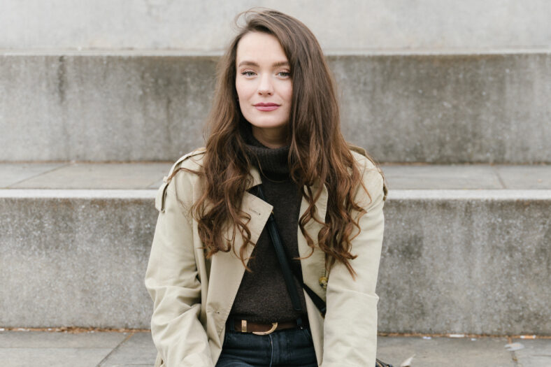 Young beatiful woman portrait in the historical city centre of Ljubljana in trendy outfit