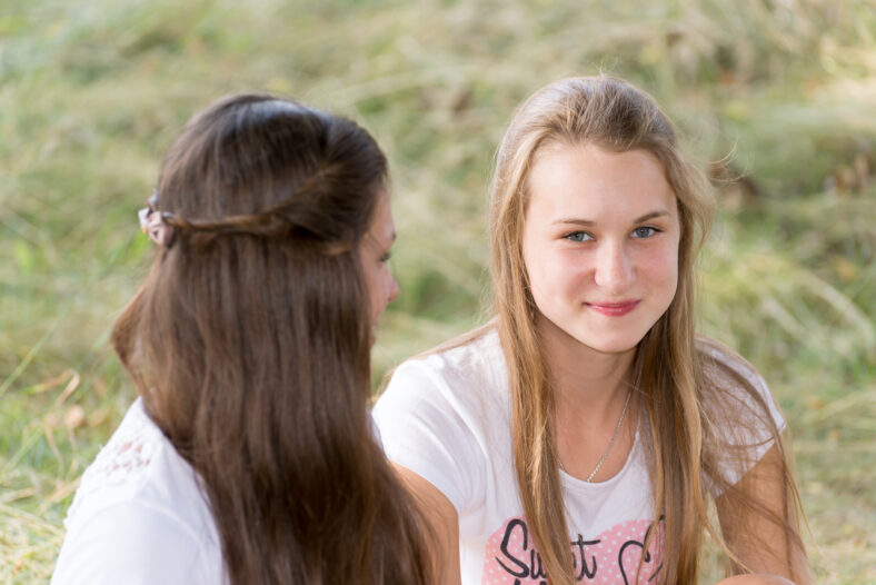 Two girls of 14 years on the nature