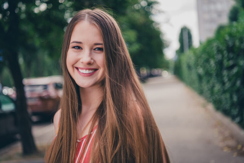 Portrait of adorable charming girl wear trendy clothes walk city summer trip good mood outdoors.