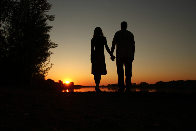 silhouette of a couple in love at sunset