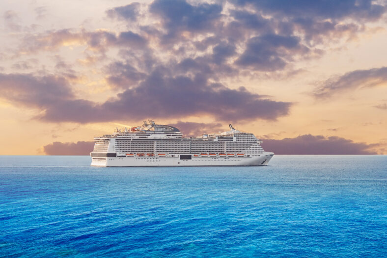 Luxury cruise ship vacation in blue azure sea sky with clouds sunset. Concept travel background.