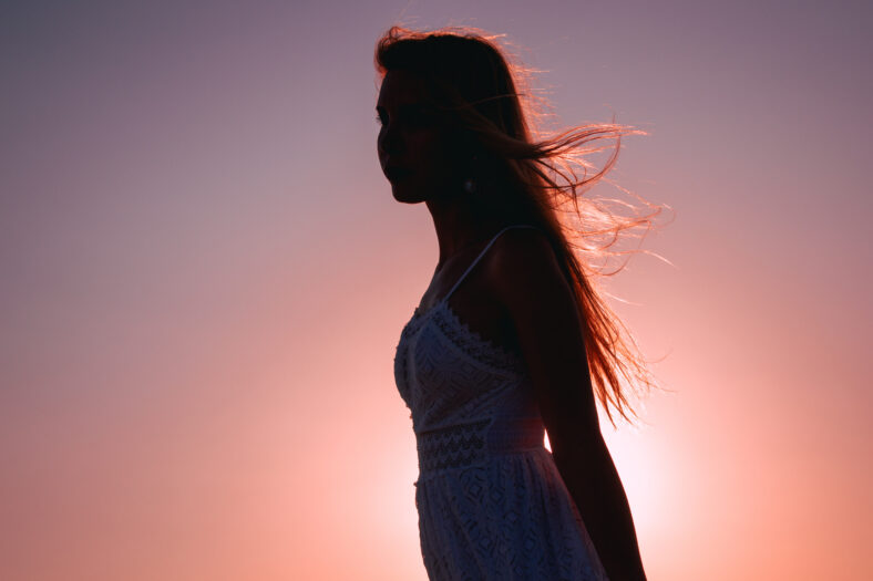 silhouette of a woman on sunset