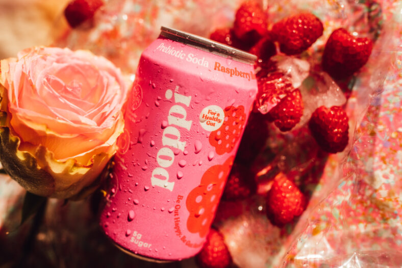pink 12 oz can of Poppi Prebiotic Soda Raspberry Rose