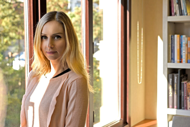 beautiful young blonde women in office