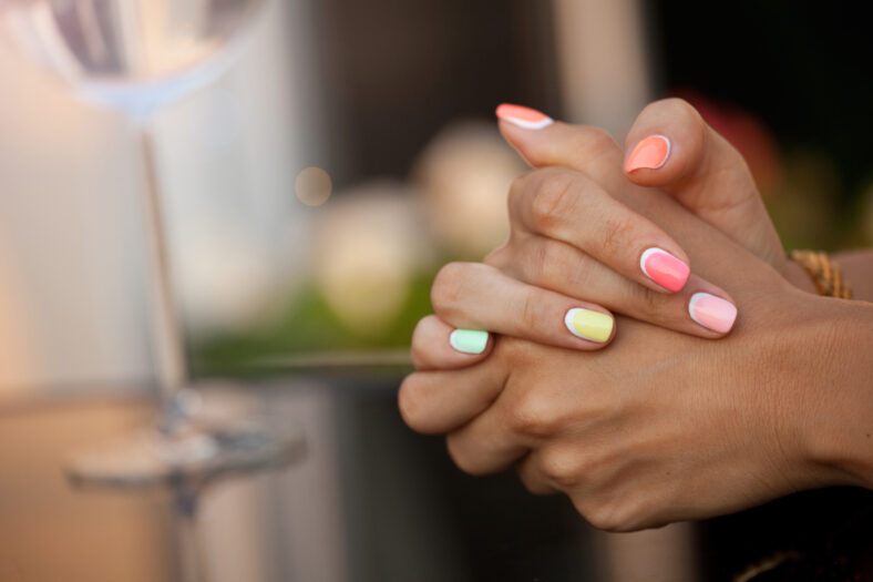 Close-up of woman hands with beautiful trendy manicure.