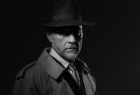 Confident man wearing a fedora hat and