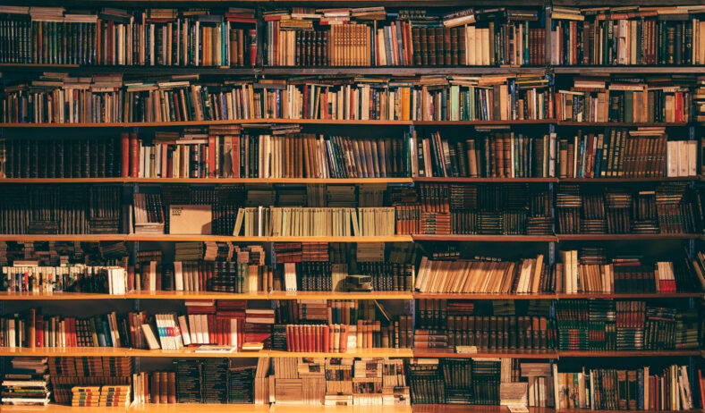 books on a shelf in a library