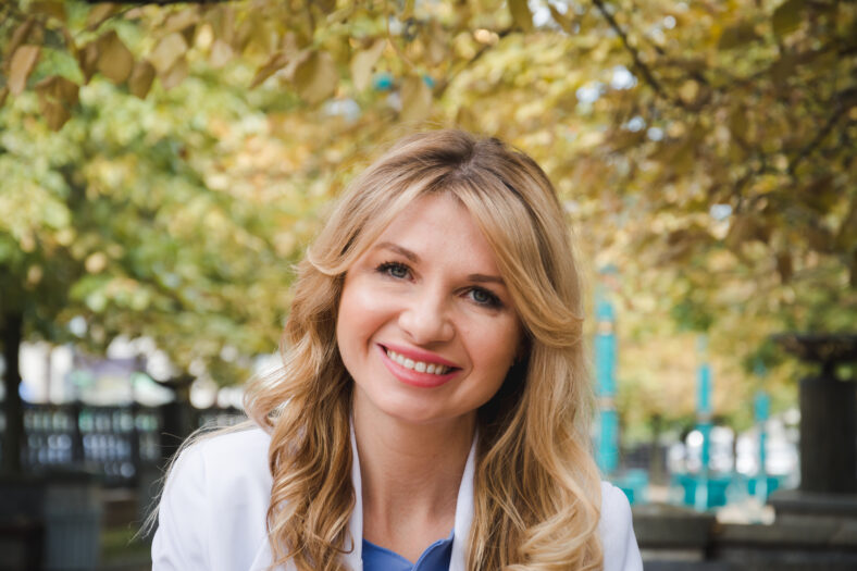 Beautiful white businesswoman portrait in the city