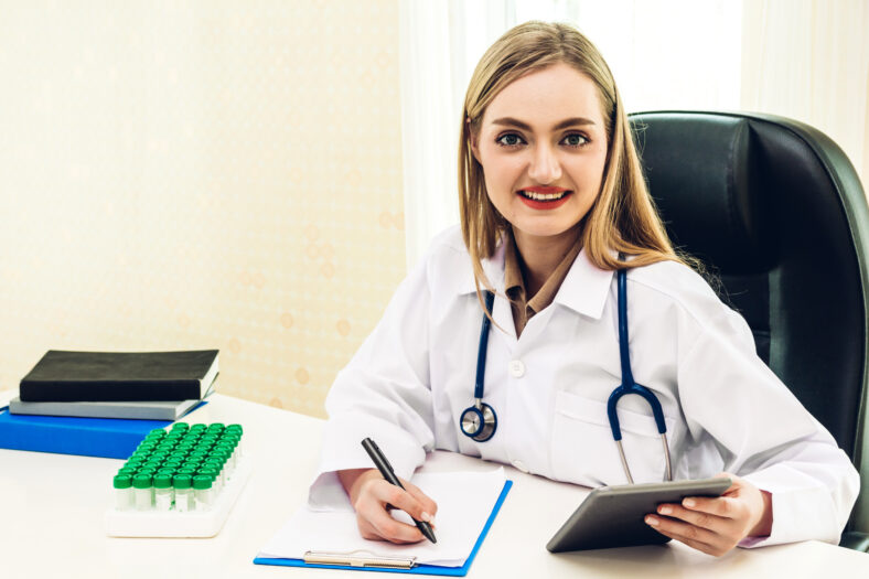 Female doctor and stethoscope working with computer in hospital.healthcare and medicine