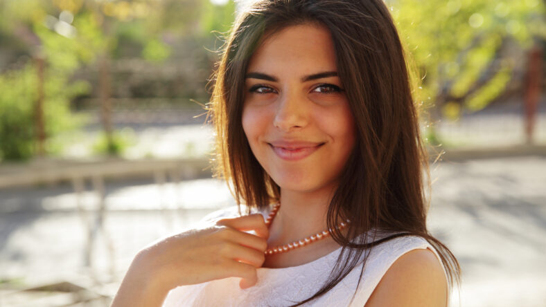Portrait of a attractive happy woman outdoors