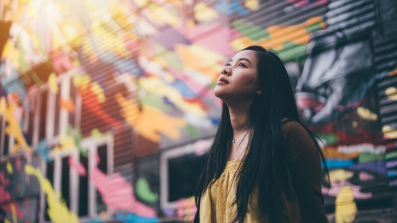 Portrait of young pretty hipster asian woman