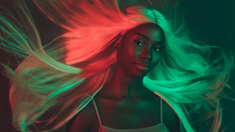 Portrait of adorable gentle lady demonstrate shine glance strong hair flying after spa procedure on dark background.