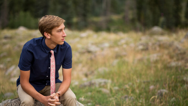 Portrait of teenage boy in forest