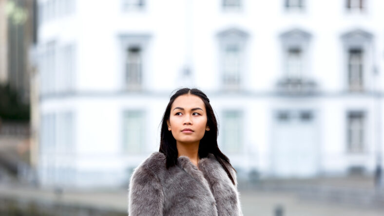 Beautiful portrait of fashionable asian woman in winter clothes