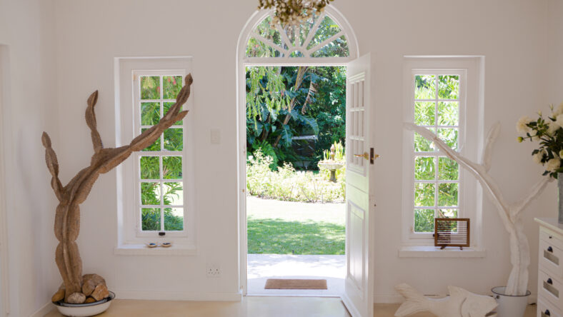 Open front door of modern house
