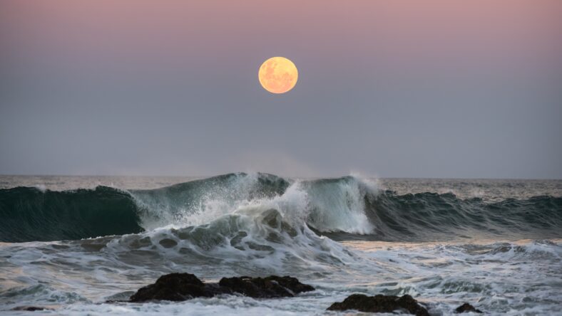 Supermoon rising over the ocean, Australia
