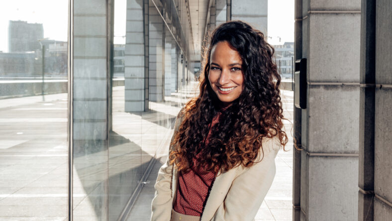 outdoors photo portrait of elegant smiling Hispanic lady