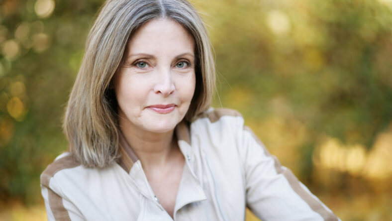 pretty middle-aged woman in the park