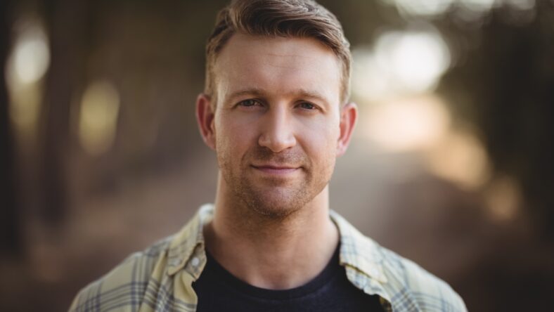 Portrait of handsome young man at olive farm