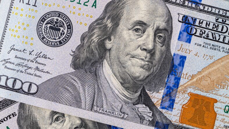 Close up of new hundred dollar bill. American cash dollars close-up , a large amount of cash American dollars in cash paper bills
