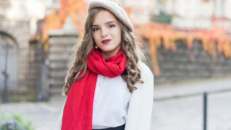 Young beautiful teenage girl in autumn park.