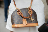 Woman with small Louis Vuitton bag and