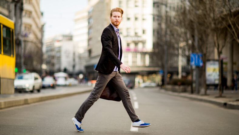 Young man walking on the street