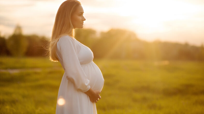 pregnant at sunset