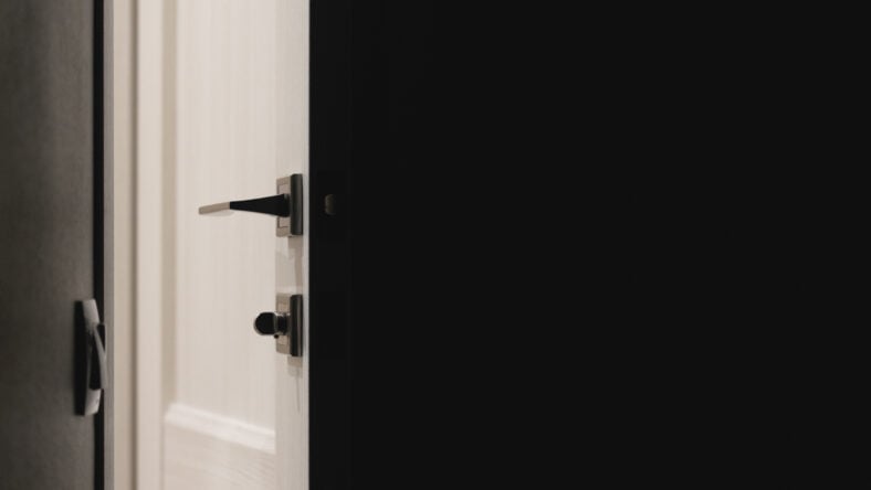 Light from an open door at night