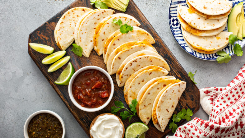 Baked tacos with pulled chicken and cheese
