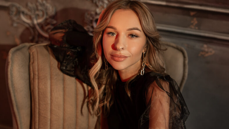 portrait of a young beautiful woman with makeup and hairstyle