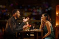 Young Caucasian man telling funny stories to