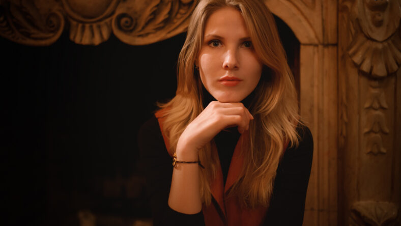 Portrait of beautiful young woman. High ISO