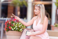 Cute woman pay for lunch in restaurant