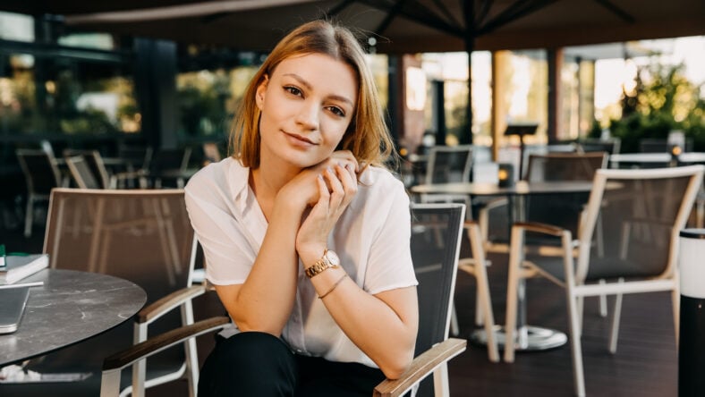 Young pretty woman, wearing a white shirt,