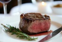 Grilled beef steak paired with red wine,