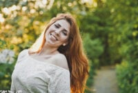 Girl with long red hair.