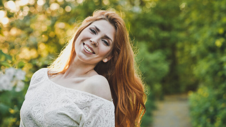 Girl with long red hair.