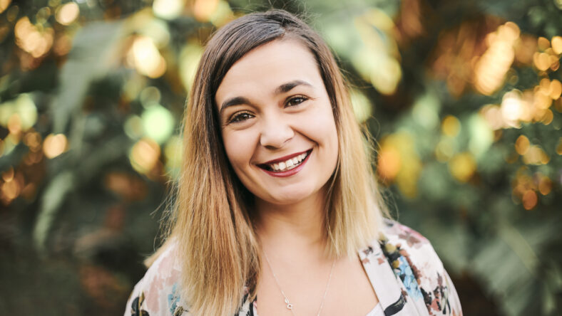Face portrait, smile and woman outdoor with