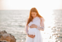 Happy pregnant woman 20-24 year old wearing