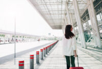 Look from behind at woman with red